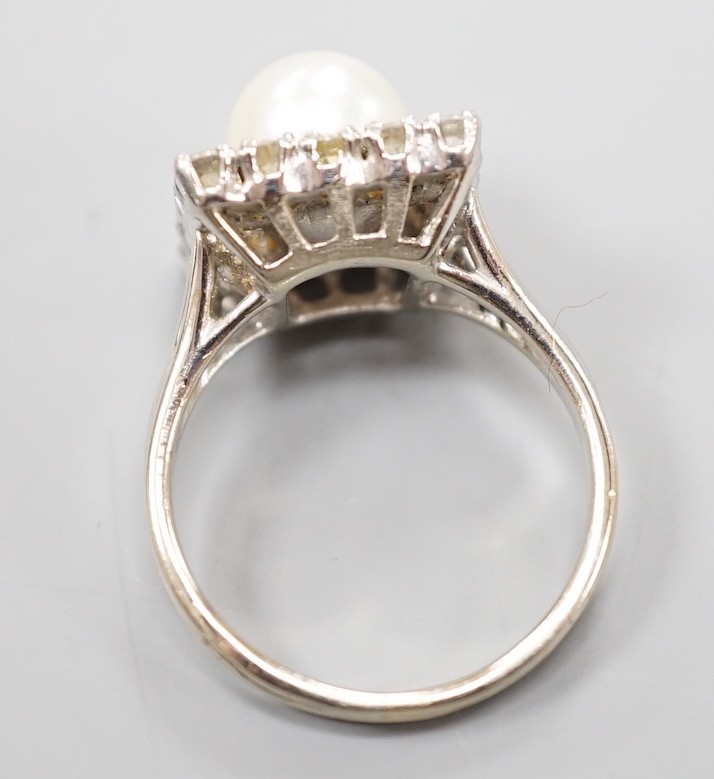 A white metal, cultured pearl and diamond set square cluster ring, size M, gross weight 5.5 grams.